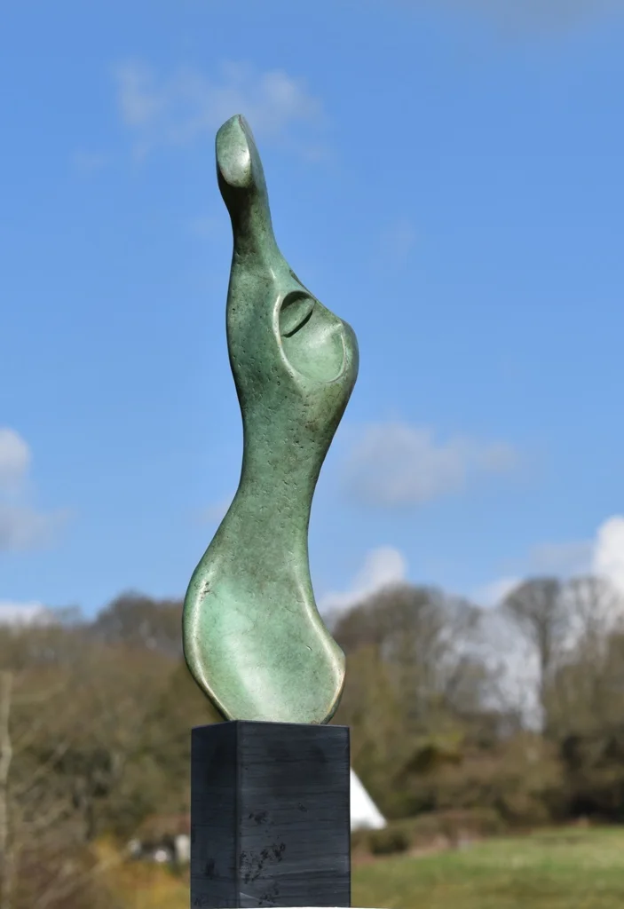 Abstract bronze sculpture of a human torso