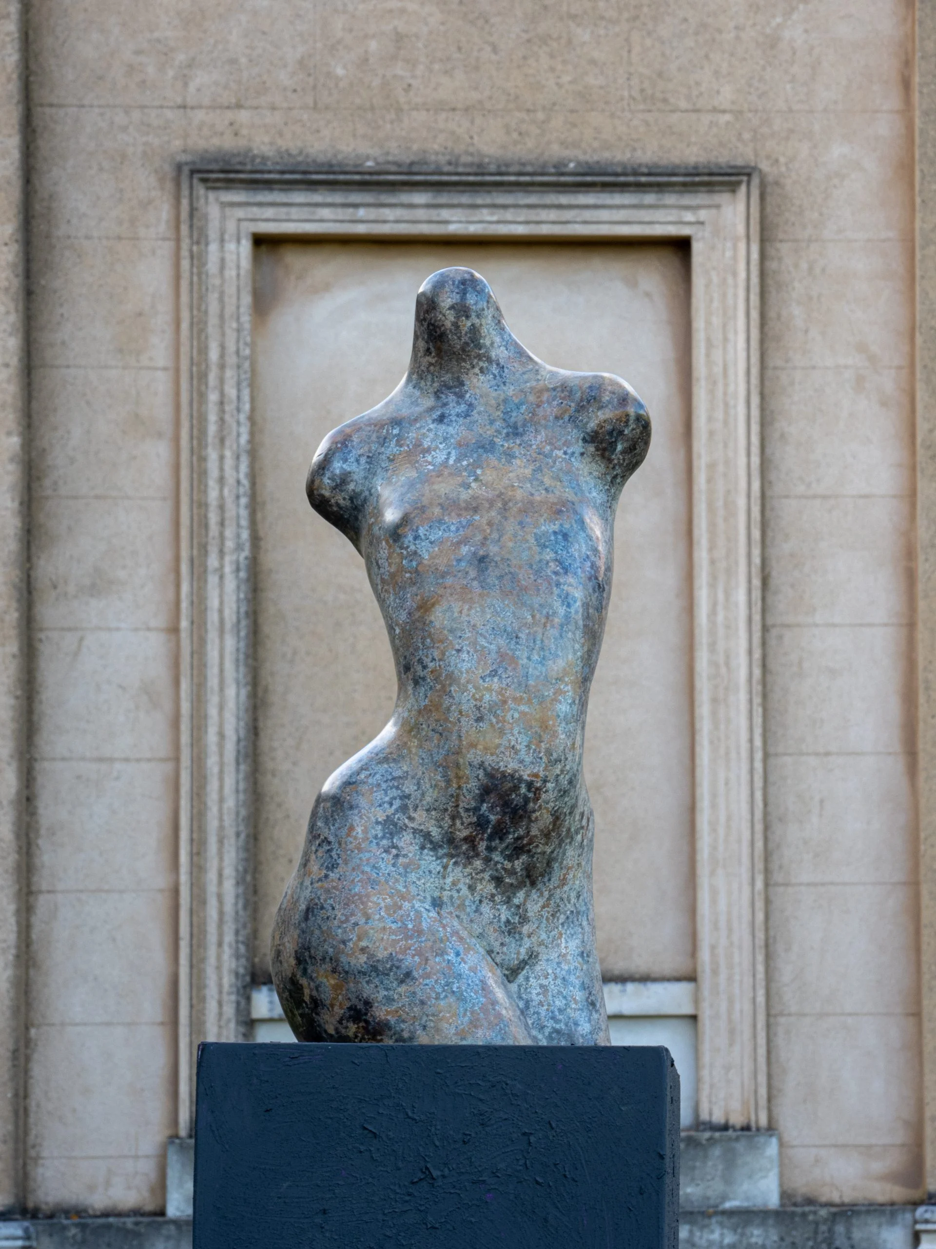 Figurative bronze sculpture of a female human torso