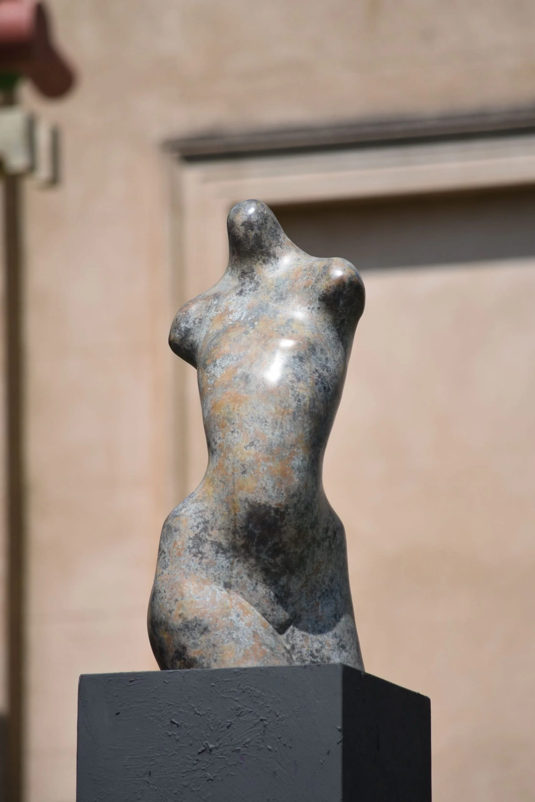 Figurative bronze torso