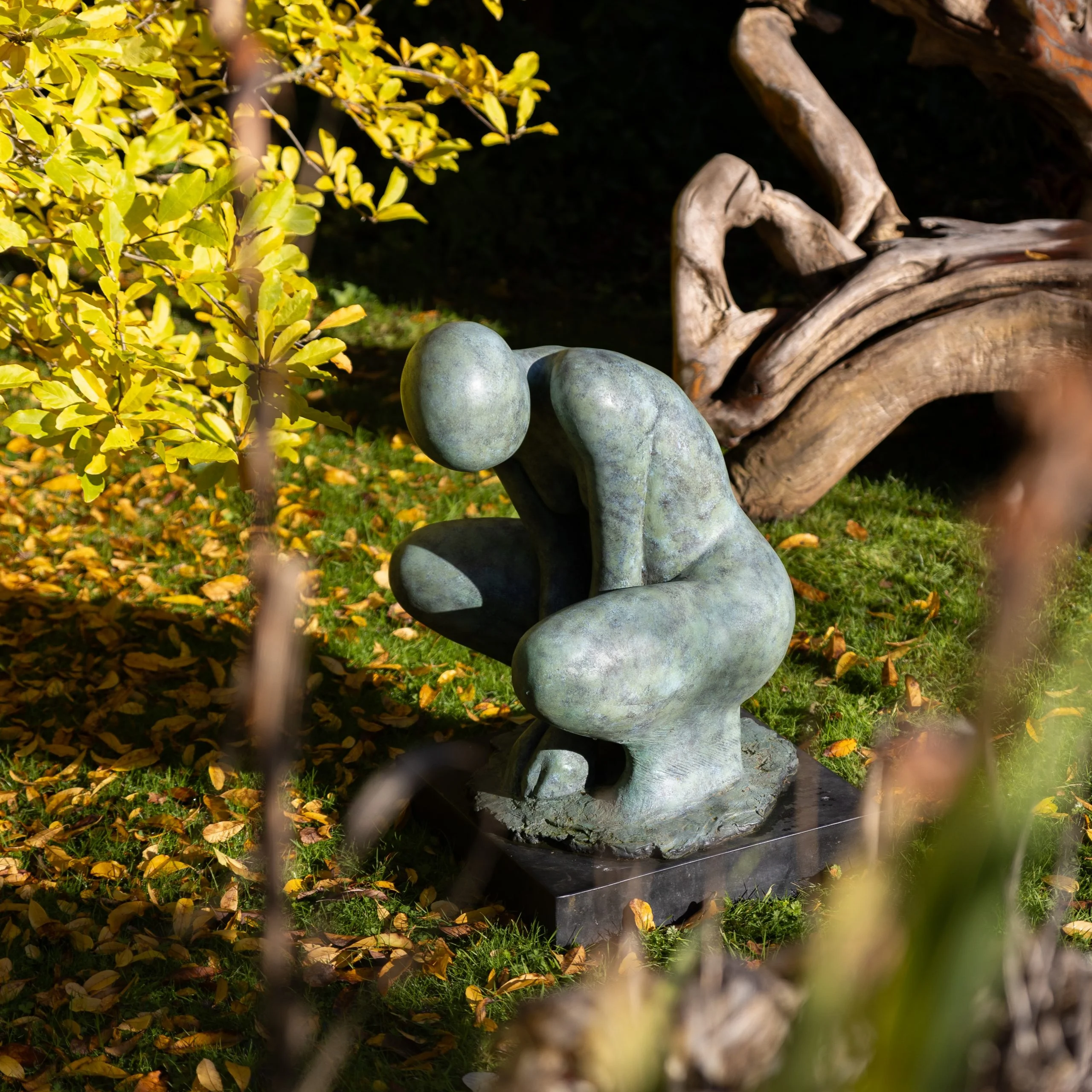 Bronze sculpture the Greek goddess of earth and mother of all life in a beautiful garden